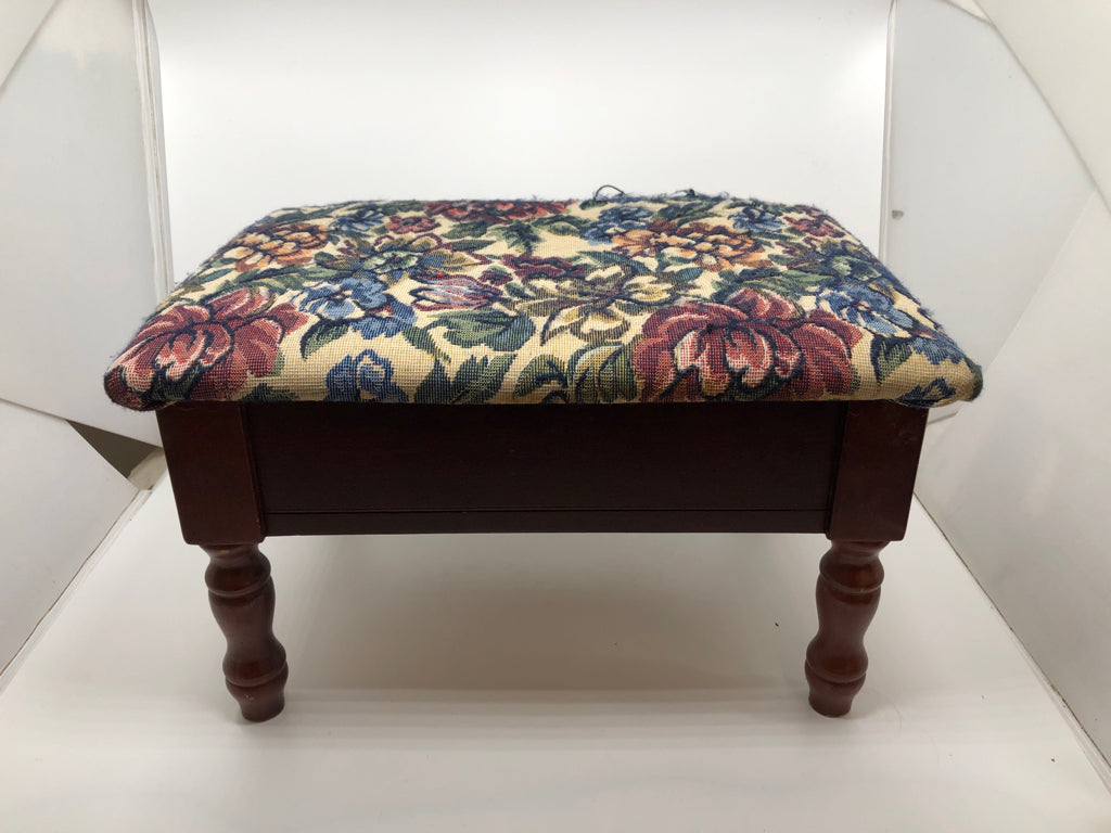 VTG BLUE FLORAL UPHOLSTERED STOOL W/WOOD BASE AND STORAGE.