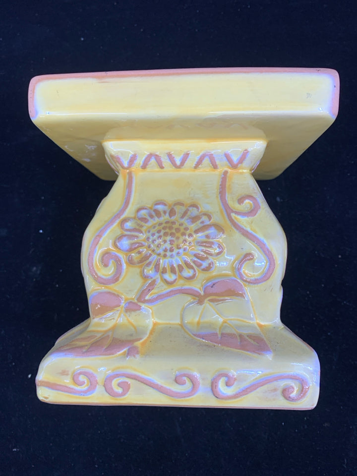 YELLOW, PINK, WHITE FLORAL DESIGN CANDLE PEDESTAL.