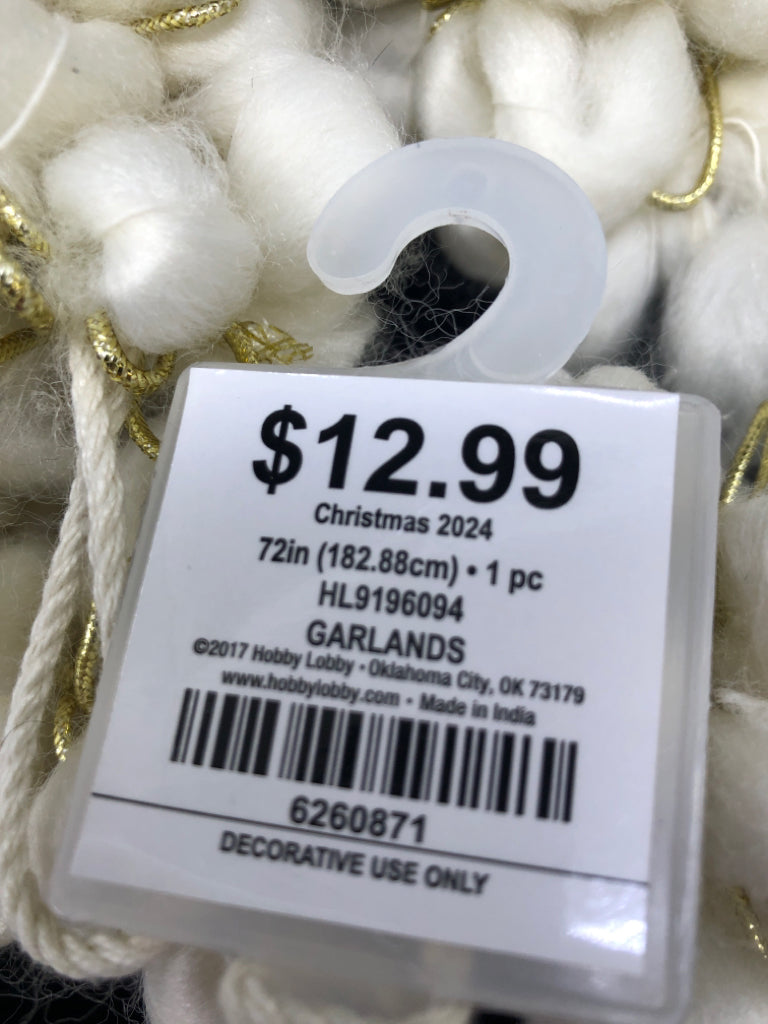 NWT WHITE AND GOLD SHAG GARLAND.