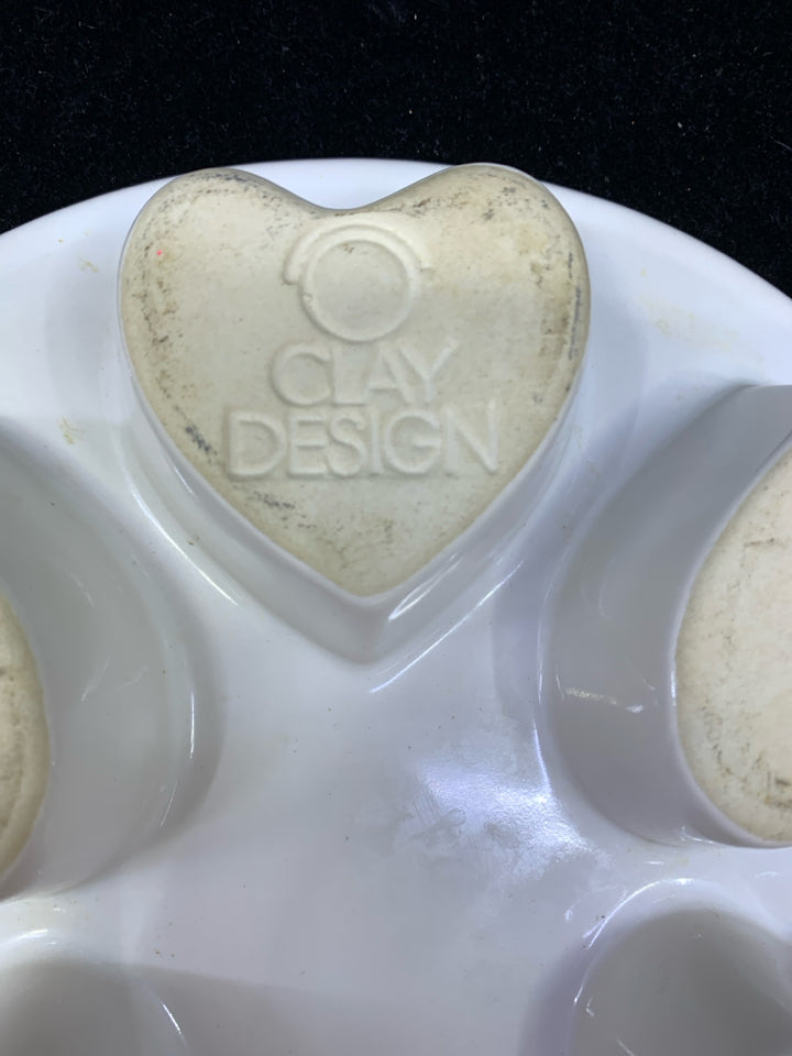 WHITE ORANGE/GREEN PUMPKIN HEART MUFFIN PAN.