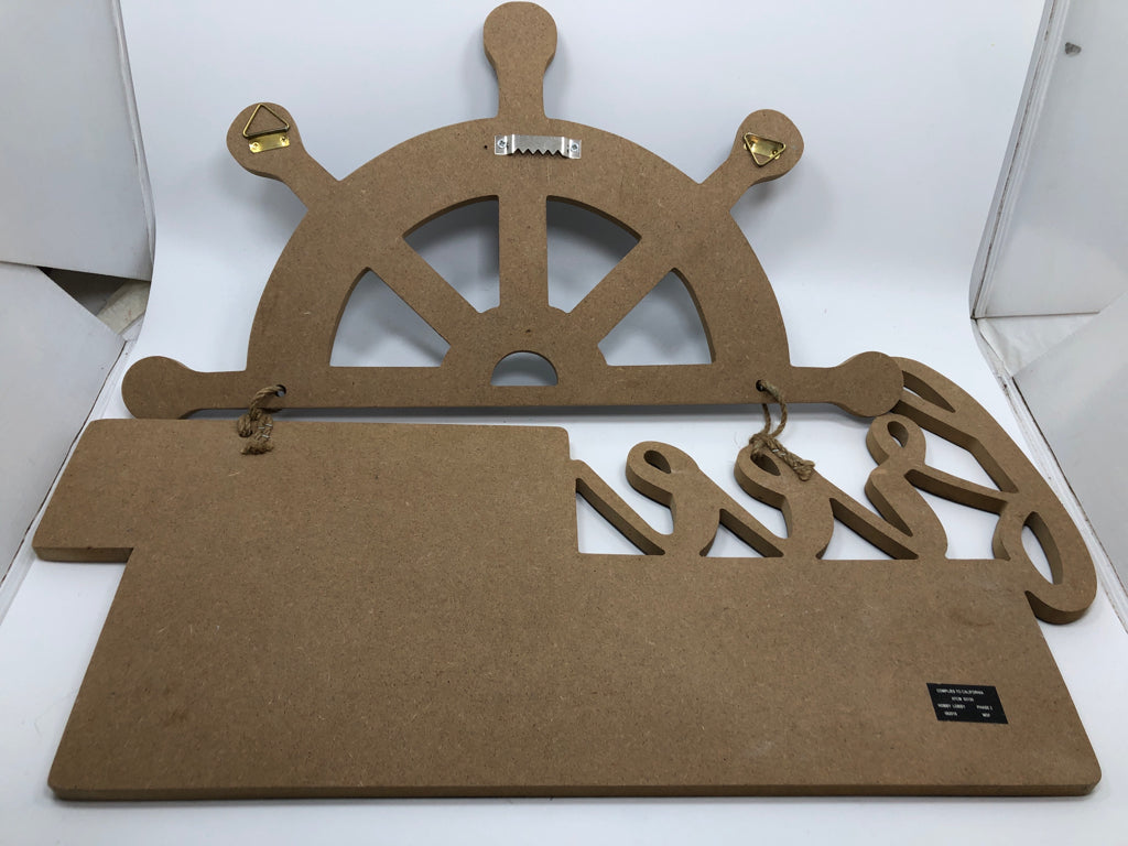 FREE AS THE BREEZE SHIPS WHEEL WOOD WALL HANGING.