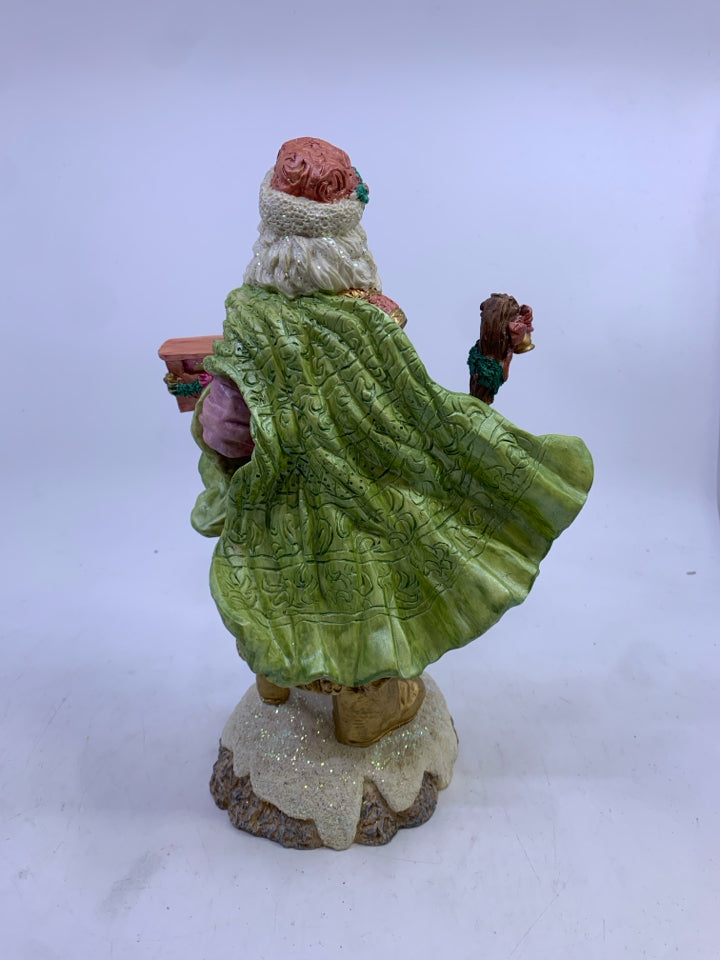 RESIN SPARKLE SANTA HOLDING STICK/TRAIN.