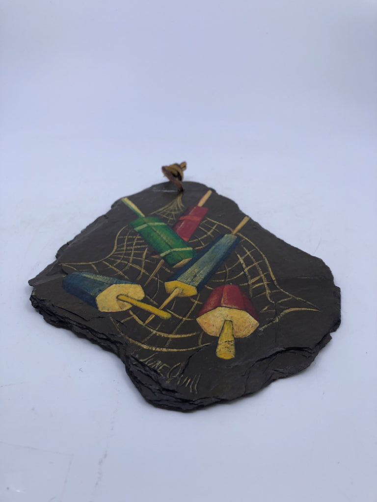 BROWN PAINTED SLATE W/ COLORED BUOYS WALL HANGING.
