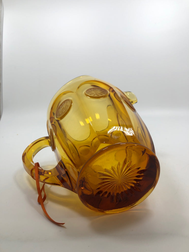 VTG AMBER GLASS PITCHER.