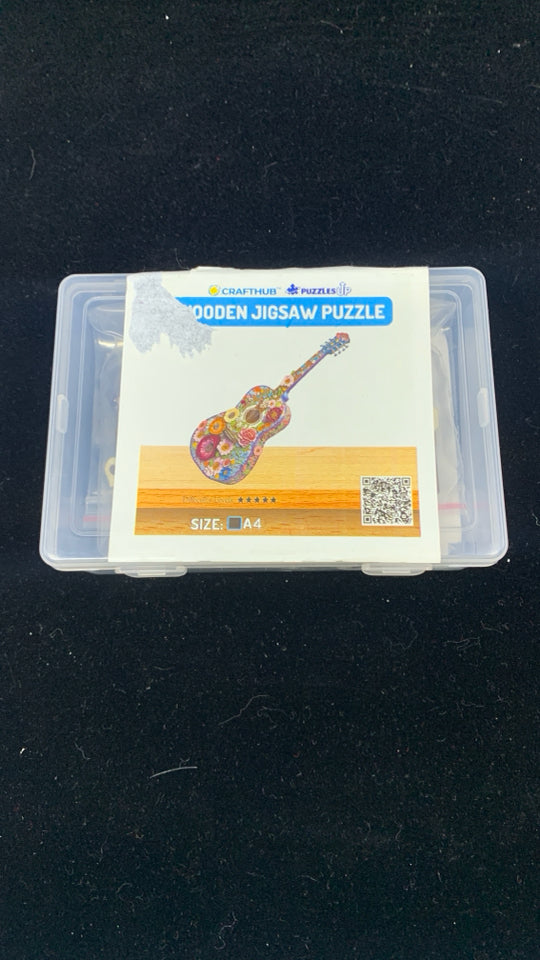 NIB WOODEN JIGSAW PUZZLE GUITAR.