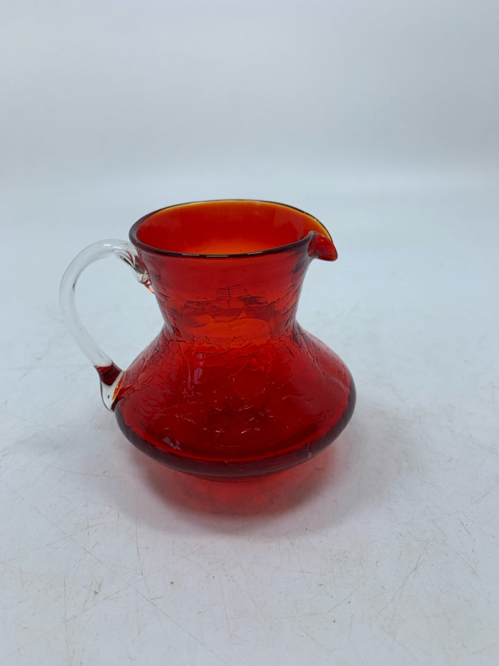 SMALL RED CRACKLE BLOWN GLASS PITCHER.