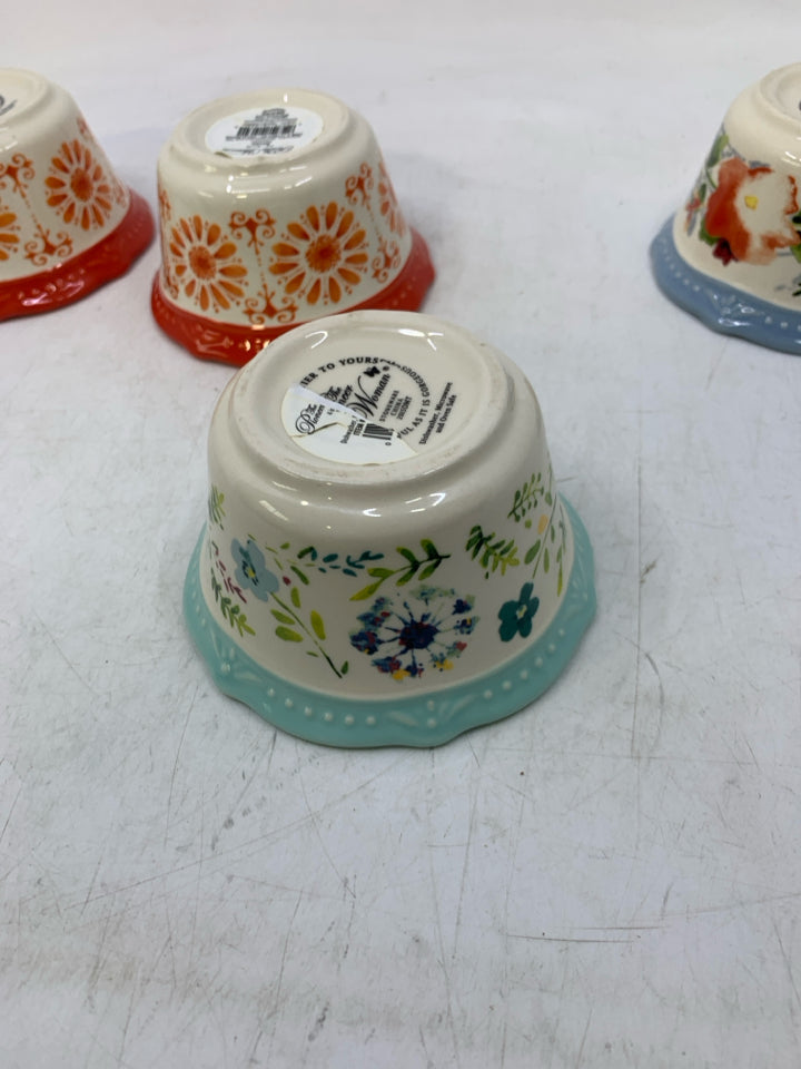4 ASSORTED FLORAL SPICE BOWLS.