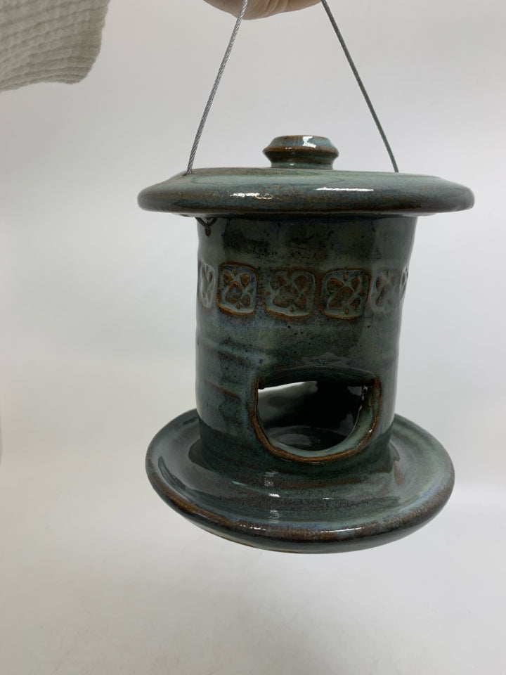 TEAL POTTERY HANGING BIRD FEEDER.