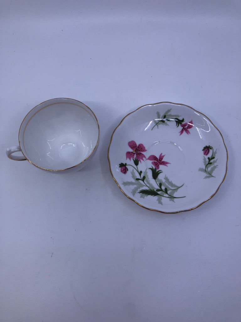PINK FLORAL TEACUP AND SAUCER.