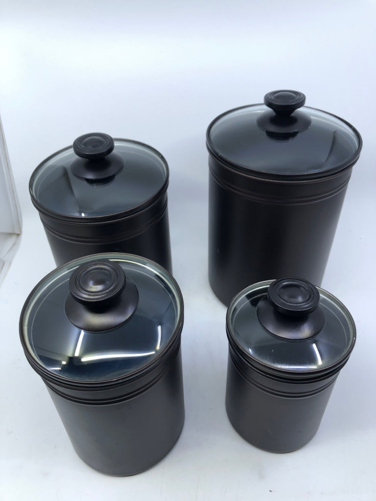 4 BROWN METAL CANISTERS.