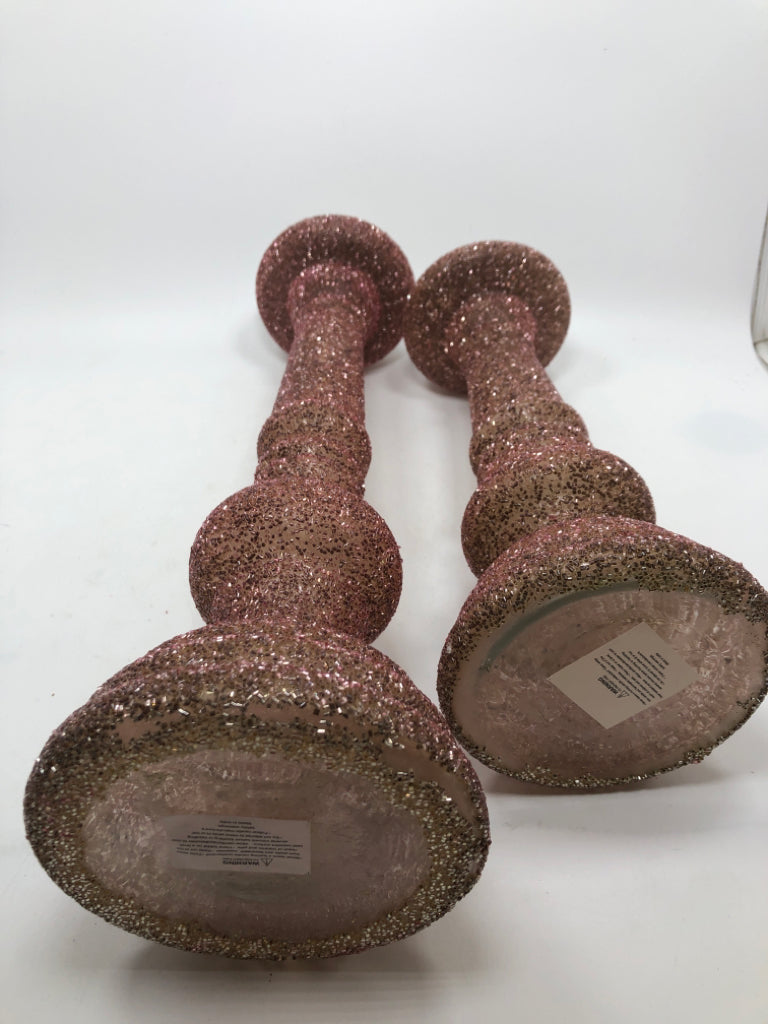 2 PINK GLITTER PILLAR CANDLE HOLDERS.