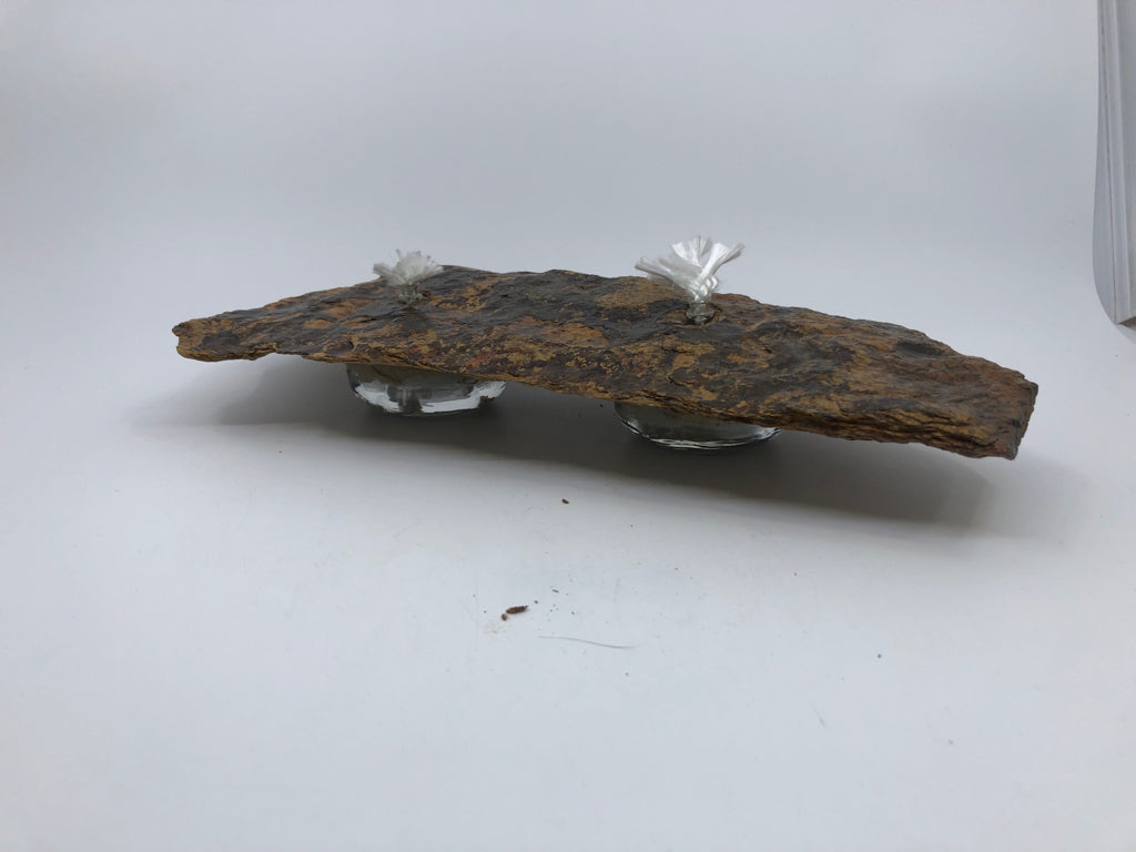 TWO TONED ROCK SLAB W/ 2 OIL LAMPS.