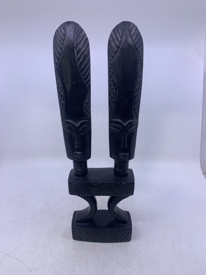 BLACK WOOD CARVES 2 HEADS FOLK ART.