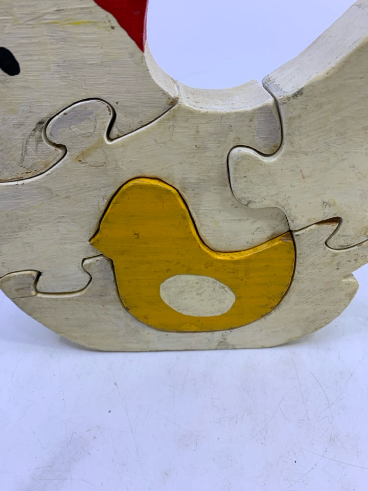 PRIMITIVE WHITE CHICKEN W/ YELLOW BABY CHICK PUZZLE PIECES.