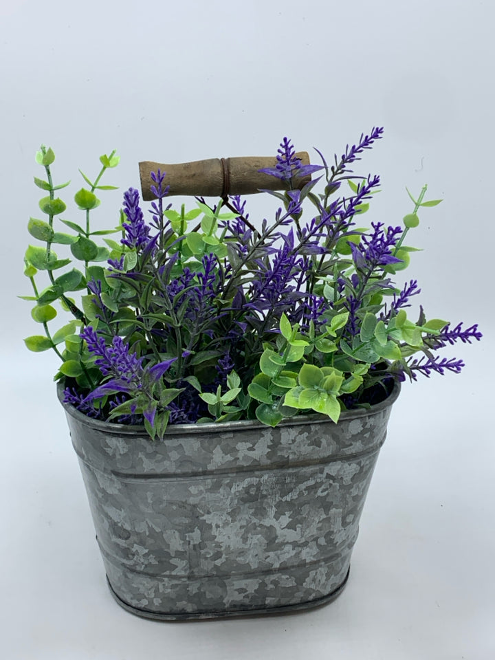 FAUX LAVENDER IN GALVANIZED BUCKET.