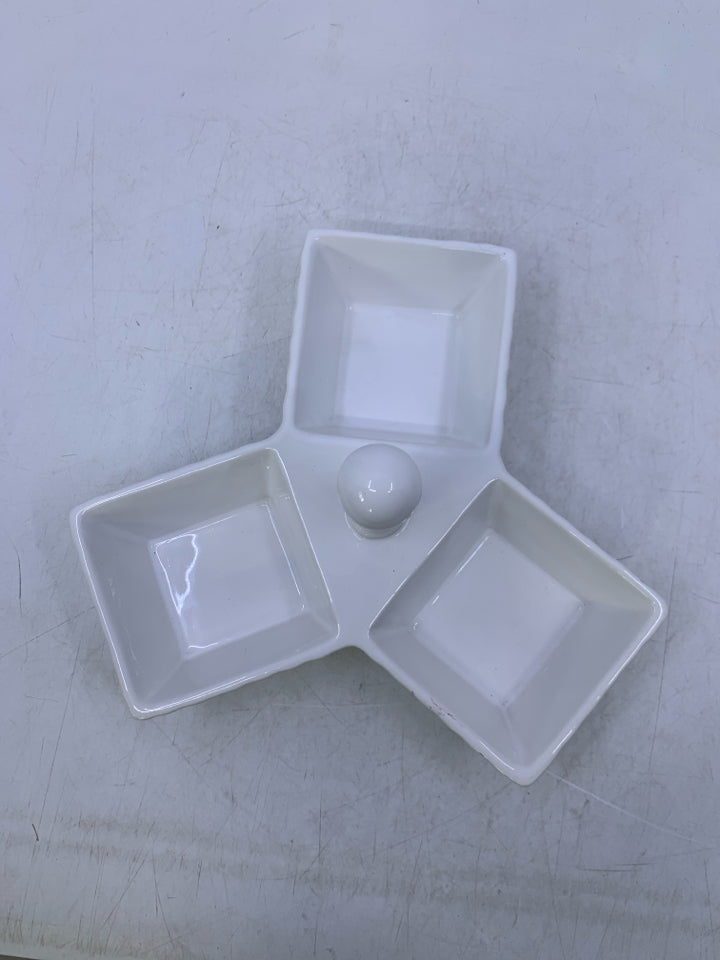 WHITE CERAMIC 3 DIVIDED SERVING PIECE W/ HANDLE IN CENTER.