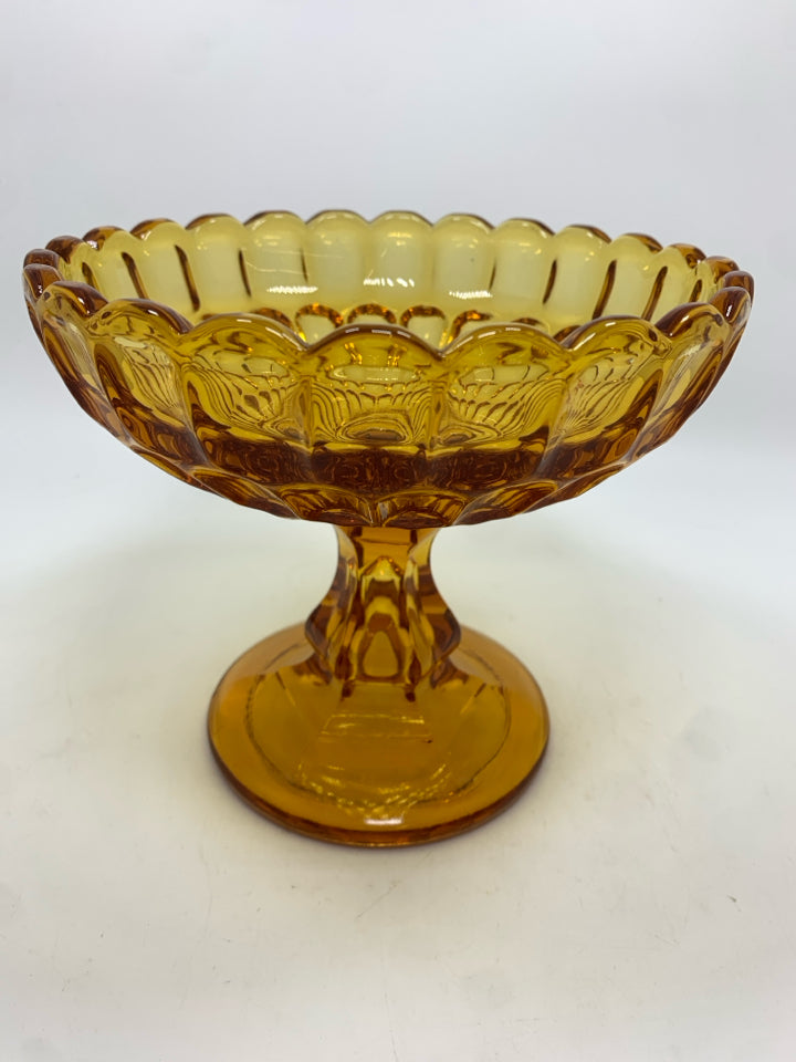 VTG AMBER GLASS FOOTED CANDY DISH.