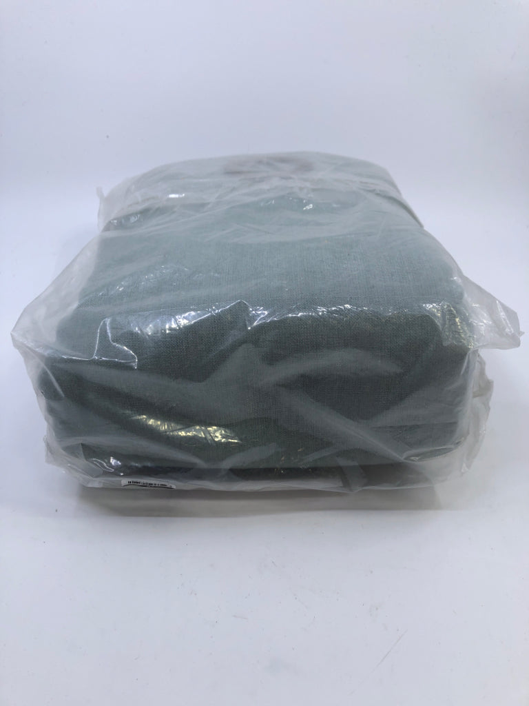 NIP TEAL ECLIPSE CURTAINS.