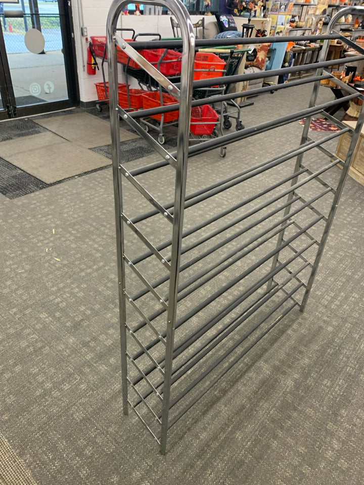 METAL NINE SHELF STANDING SHOE RACK.