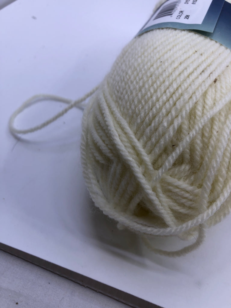 NIP ENCORE CREAM YARN.