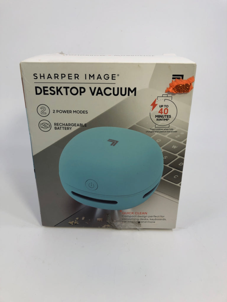 NIB SHARPER IMAGE DESKTOP VACUUM.
