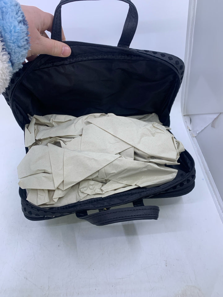 NEW BLACK W/ CUTOUTS COSMETIC TRAVEL BAG.