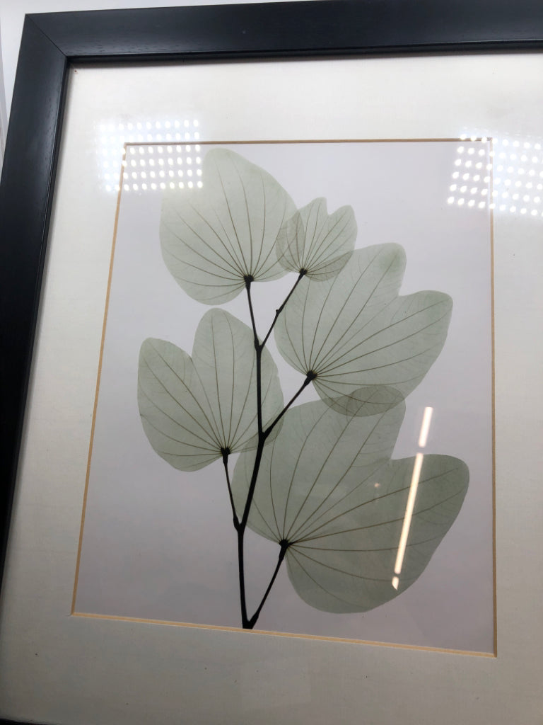 GREEN LEAVES BLACK FRAME WALL HANGING.