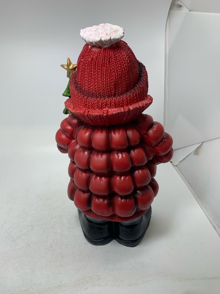 SNOWMAN IN RED PUFFER COAT HOLDING TREE.