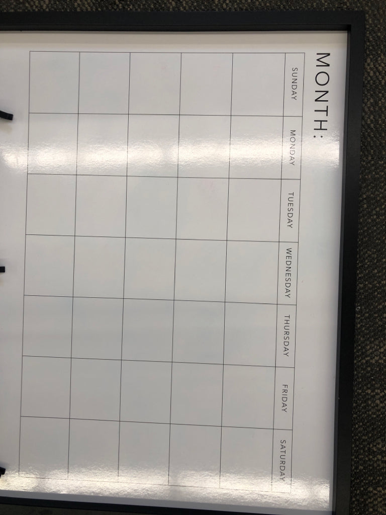 DRY-ERASE MONTHLY CALENDAR W/CLOTHES PIN MEMO BOARD.