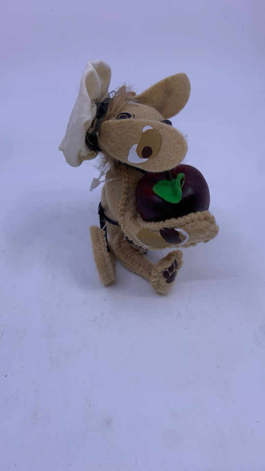 ANNA LEE FELT DOG HOLDING APPLE AND CINNAMON.