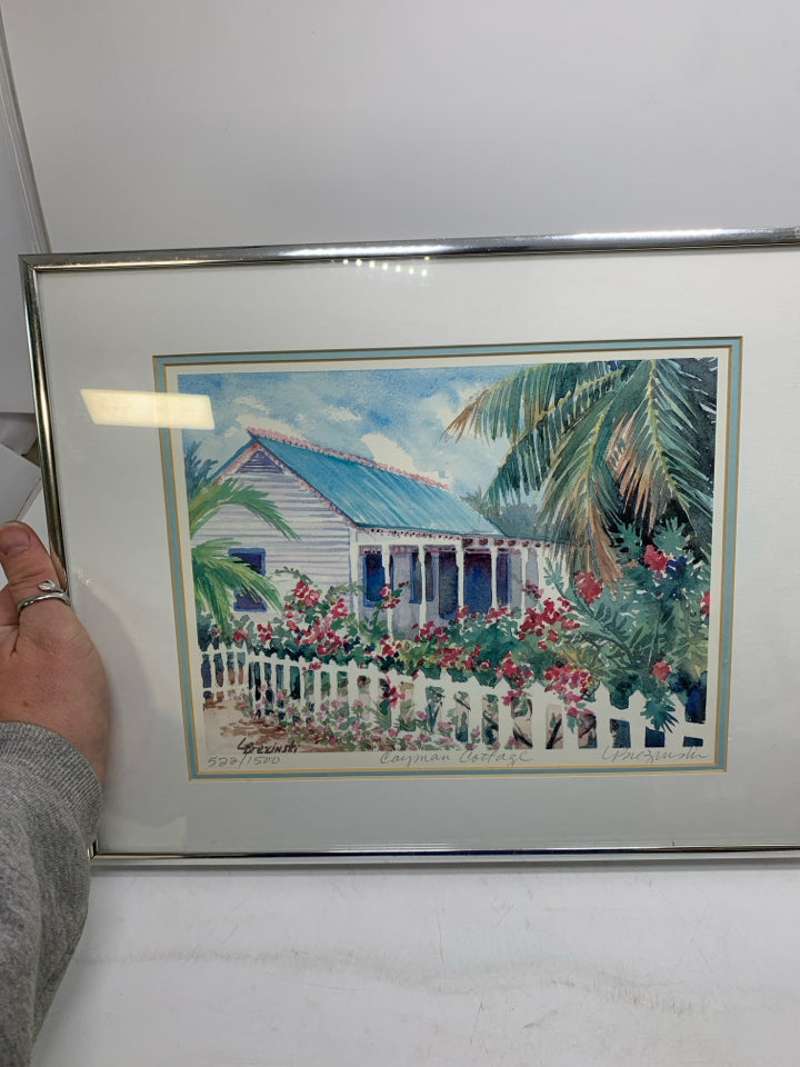 COTTAGE SCENE W/ RED FLOWERS FENCE WATERCOLOR SIGNED BY ARTIST SILVER FRAME.