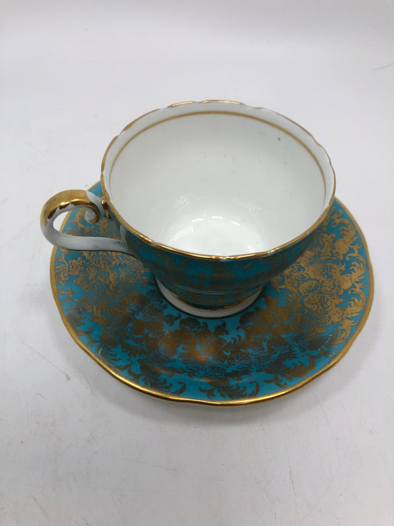 VTG GOLD FILIGREE TURQUOISE TEACUP AND SAUCER.