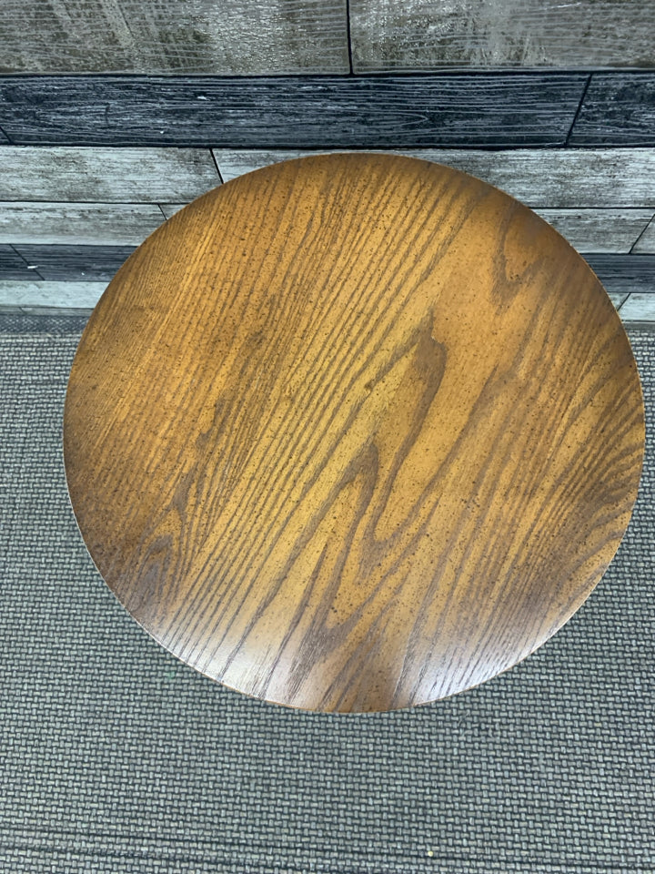 SHORT ROUND SCROLL BASE TABLE/ PLANT STAND.