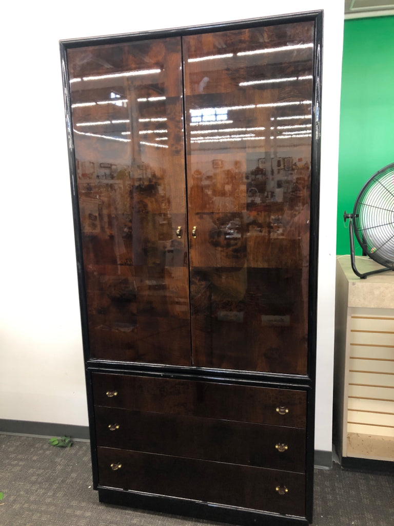 VTG BLACK W/BROWN BURLWOOD ARMOIRE W/ 4 SHELVES AND 3 DRAWERS.