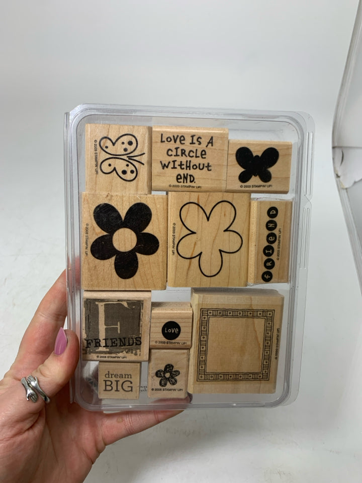 STAMPS IN CASE.