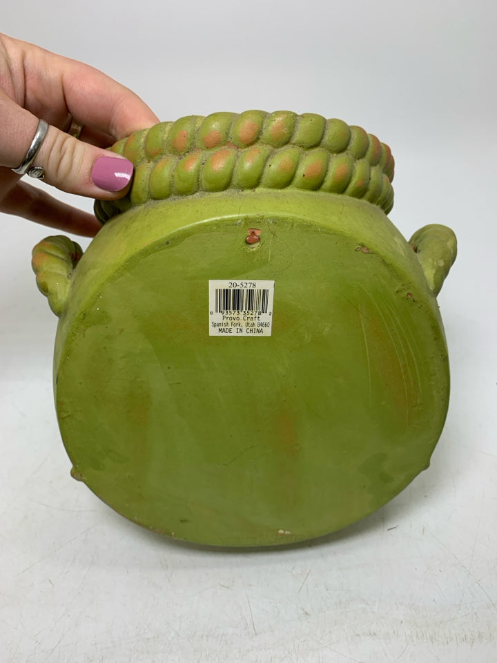 TERRA COTTA WALL VASE W/ BRAIDED HANDLES.