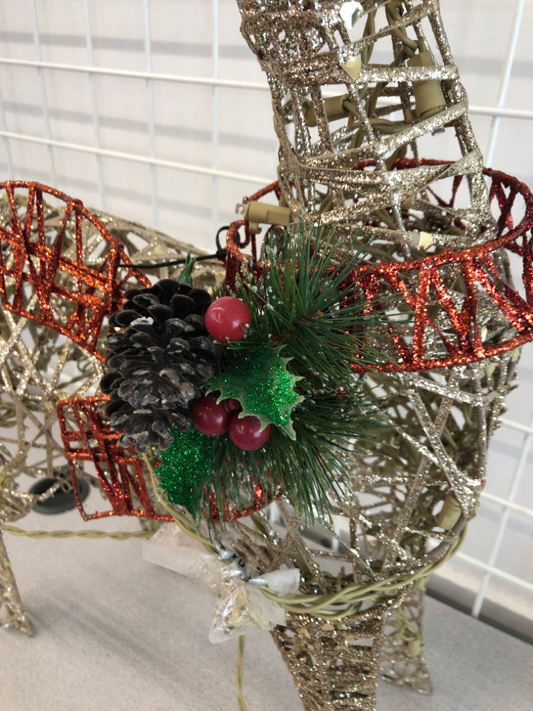 LIGHT UP SILVER GLITTER DEER W/LIGHT UP RIBBON.