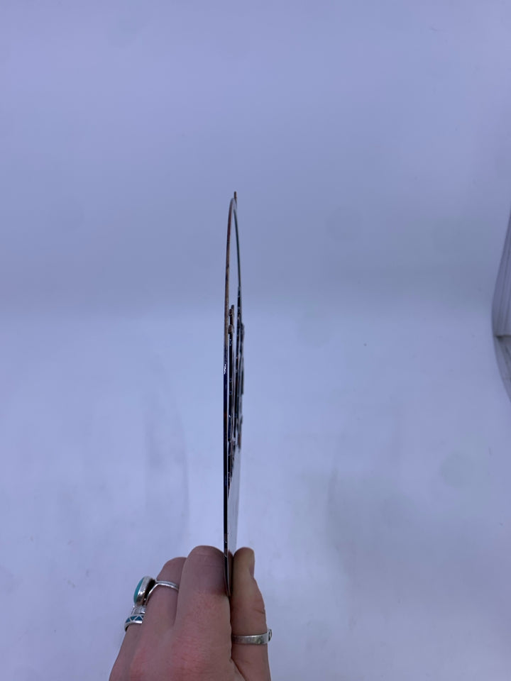 DECORATIVE METAL CIRCLE W 3 KOKOPELLI FIGURES.