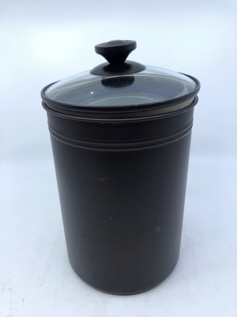 4 BROWN METAL CANISTERS.