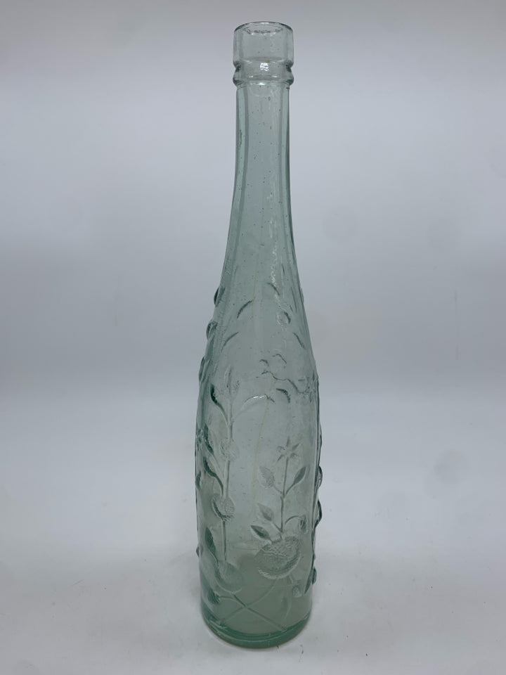 FLOWERS EMBOSSED CLEAR GLASS BOTTLE.