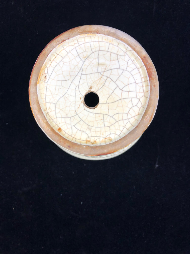 CREAM CRACKLE URN SHAPED VASE W EMBOSSED PATTERN.