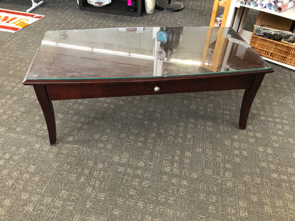 DARK WOOD COFFEE TABLE W/ DRAWER GLASS TOP.