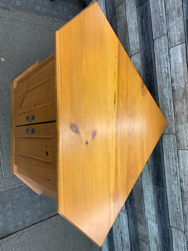 BLONDE WOOD CORNER CABINET.