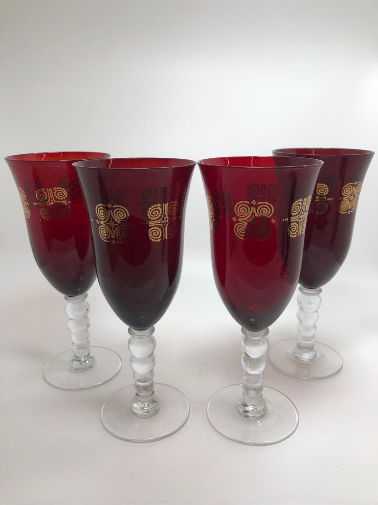 4 RUBY RED GOBLET WITH GOLD SWIRL DESIGN.