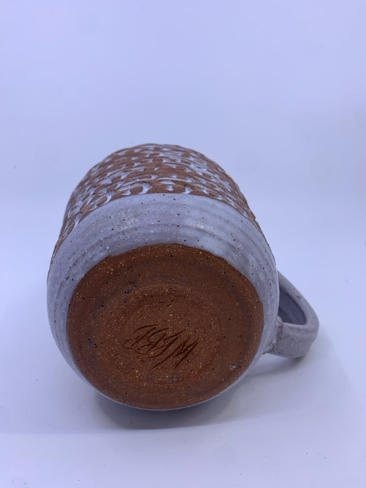 GRAY POTTERY - EMBOSSED DETAILS.