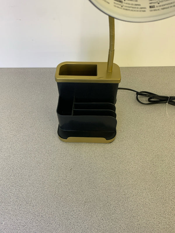 BLACK AND GOLD DESK LAMP WITH STORAGE.