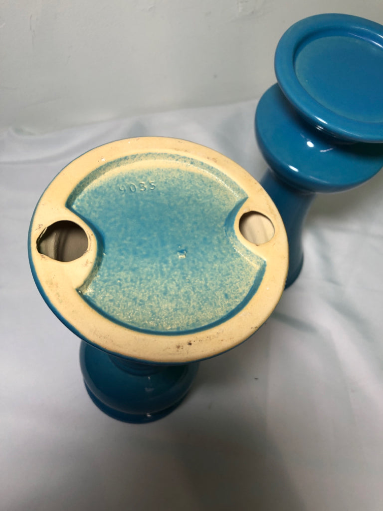 2 CERAMIC BLUE PILLAR CANDLE HOLDERS.