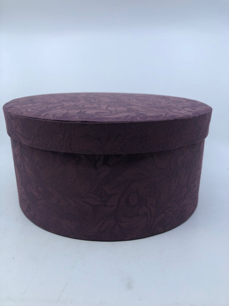 2 NESTING PURPLE FABRIC CIRCLE HAT BOXES.