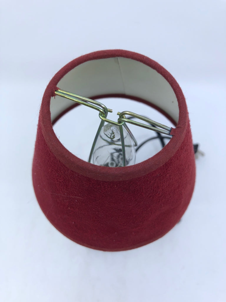 BLACK SCROLL PATTERN LAMP W RED SHADE.