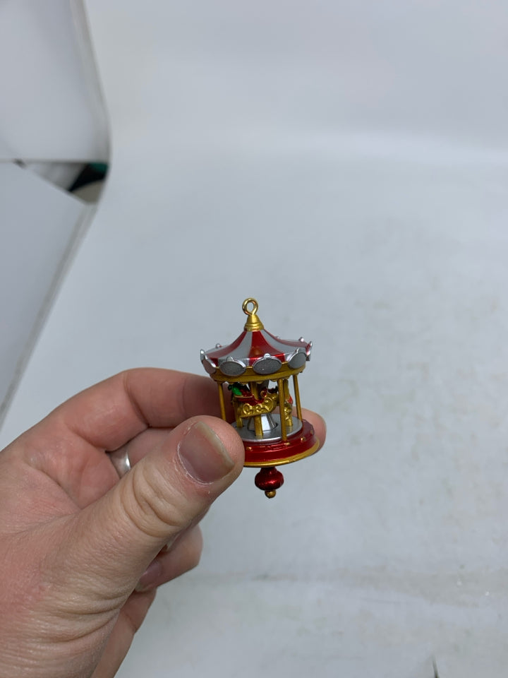 IN BOX CHRISTMAS CAROUSEL HALLMARK ORNAMENT.